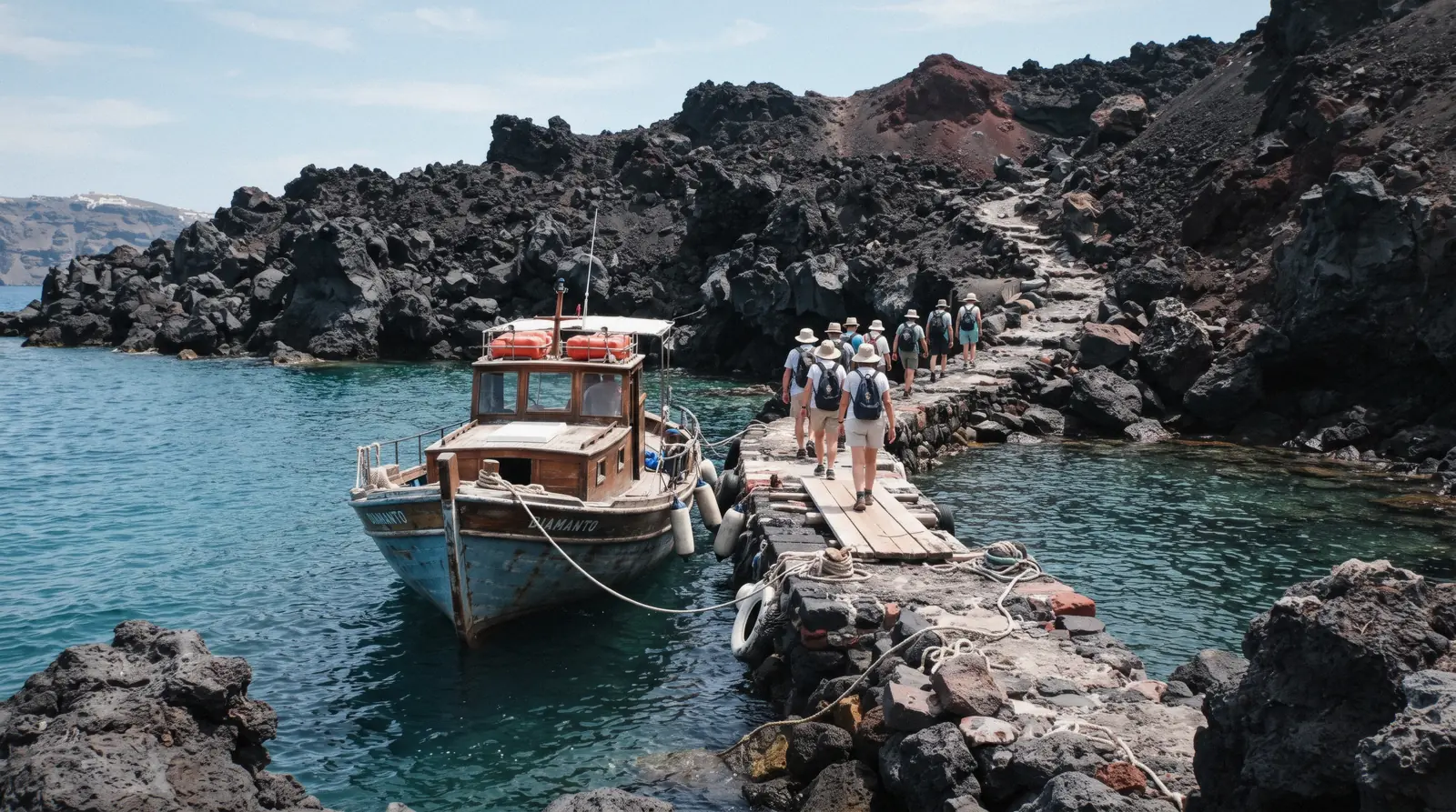 A traditional wooden excursion boat moored at the small jetty of Nea Kameni at 11:00, santorini volcano tour, Santorini Greece