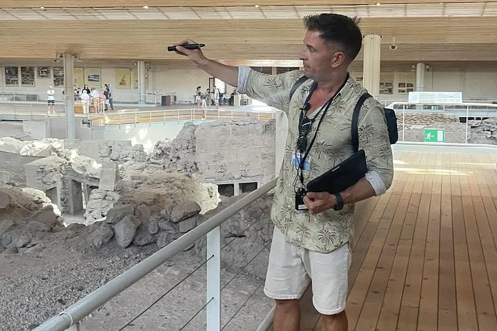 Two-storey Bronze Age houses under the roof at Akrotiri on a private archaeologist-guided tour, Santorini Greece