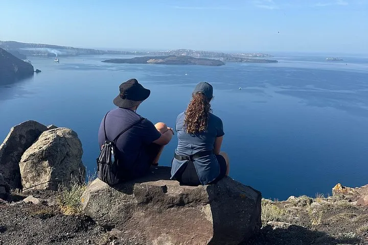 Caldera path above the cliffs on a private Fira to Oia hike, Santorini Greece