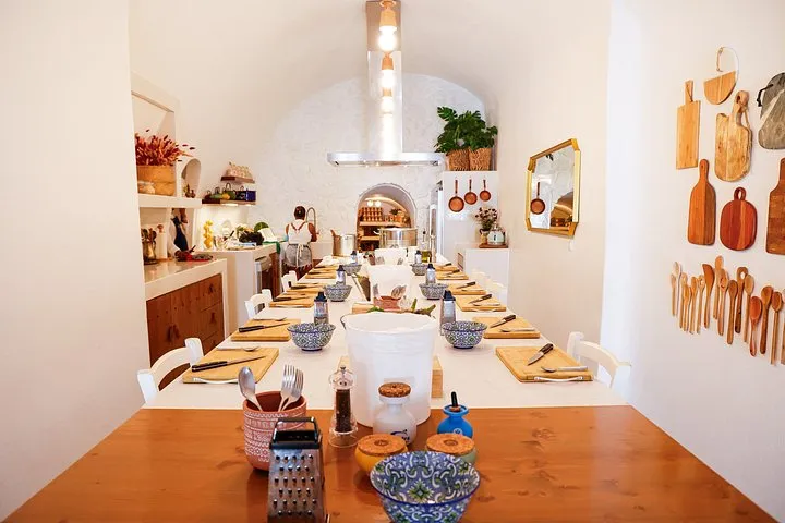 Barrel-vaulted cave house kitchen at a Santorini cooking experience, Santorini Greece