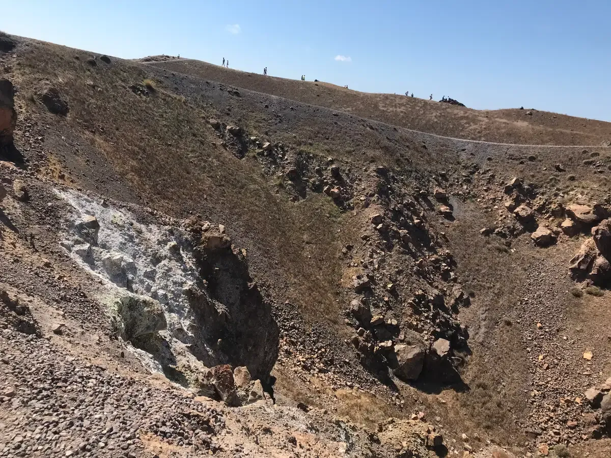 Visitors on the crater trail of Nea Kameni, Santorini Greece