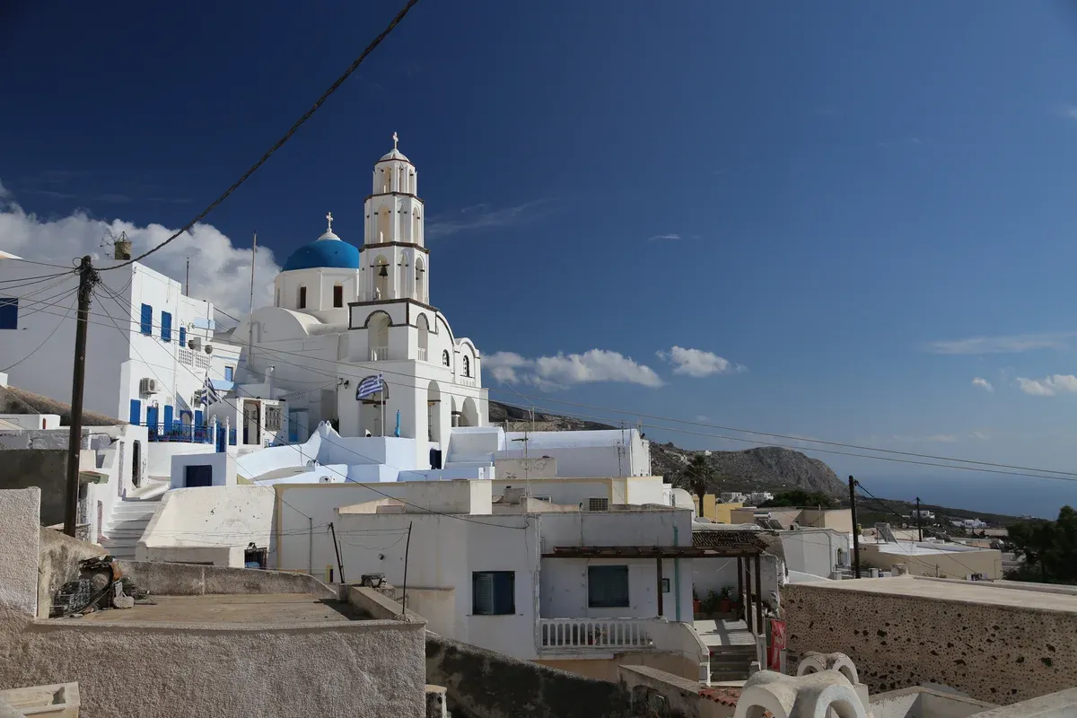 Pyrgos village and its church below the summit, Santorini Greece